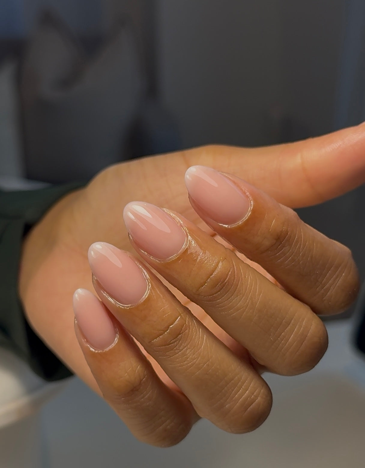 Luxury nude hard-gel nail extensions in cream and blush tones by Abbey Wood nail technician